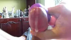Play The sperm flows from the penis onto her breasts